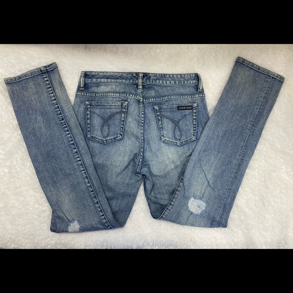 Calvin Klein blue jeans size 30/10, Ultimate Skinny, front zip button fly